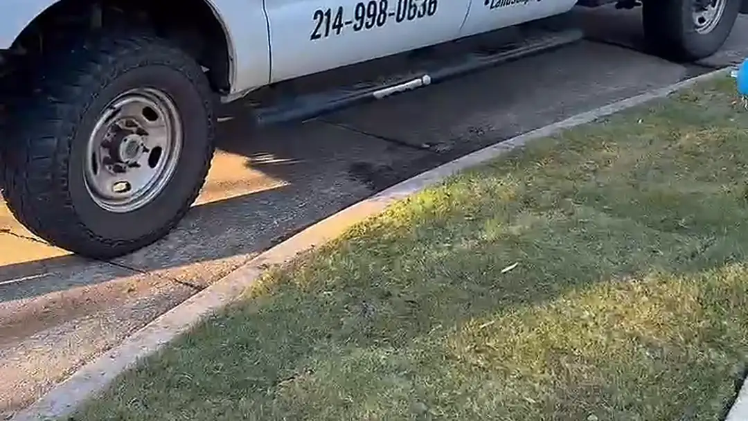 North Dallas Tree & Sod work truck beside a newly sodded lawn